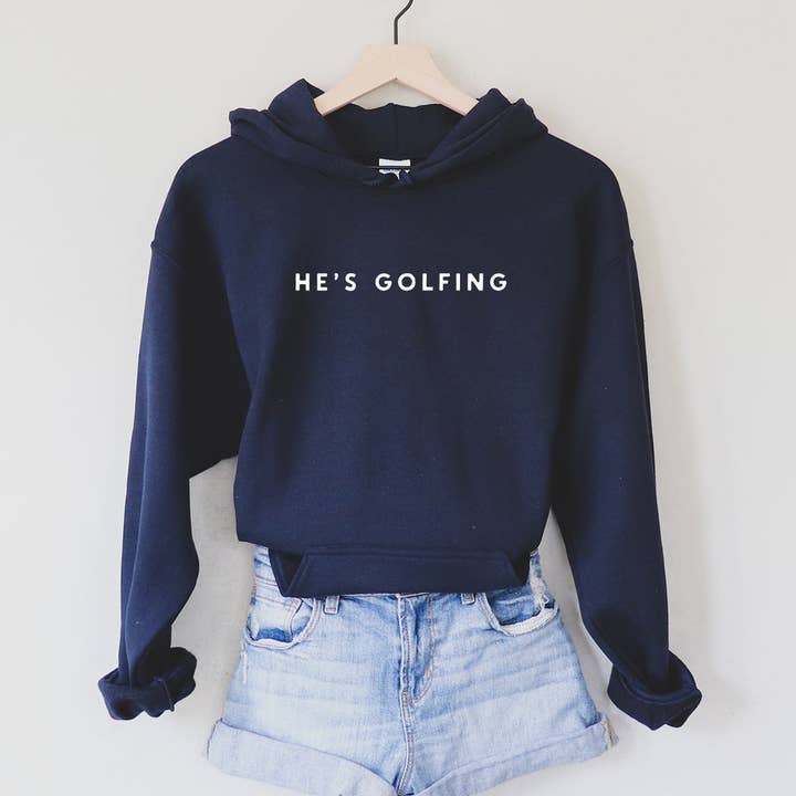 HE'S GOLFING Golf Graphic Hoodie for wholesale by Salt + Fare