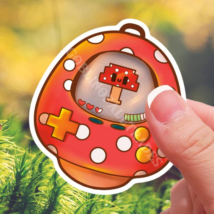 Mushroom Tamagotchi Die Cut Waterproof Sticker for wholesale by Goblin Of All Trades