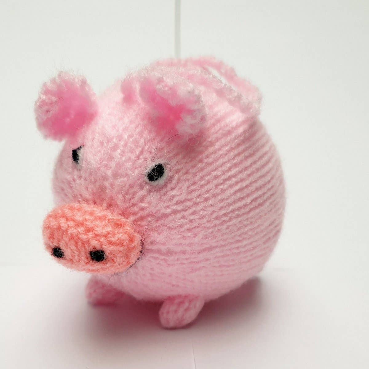 Titicaca – Engroshandel Bordpynt – Strikket rund gris1