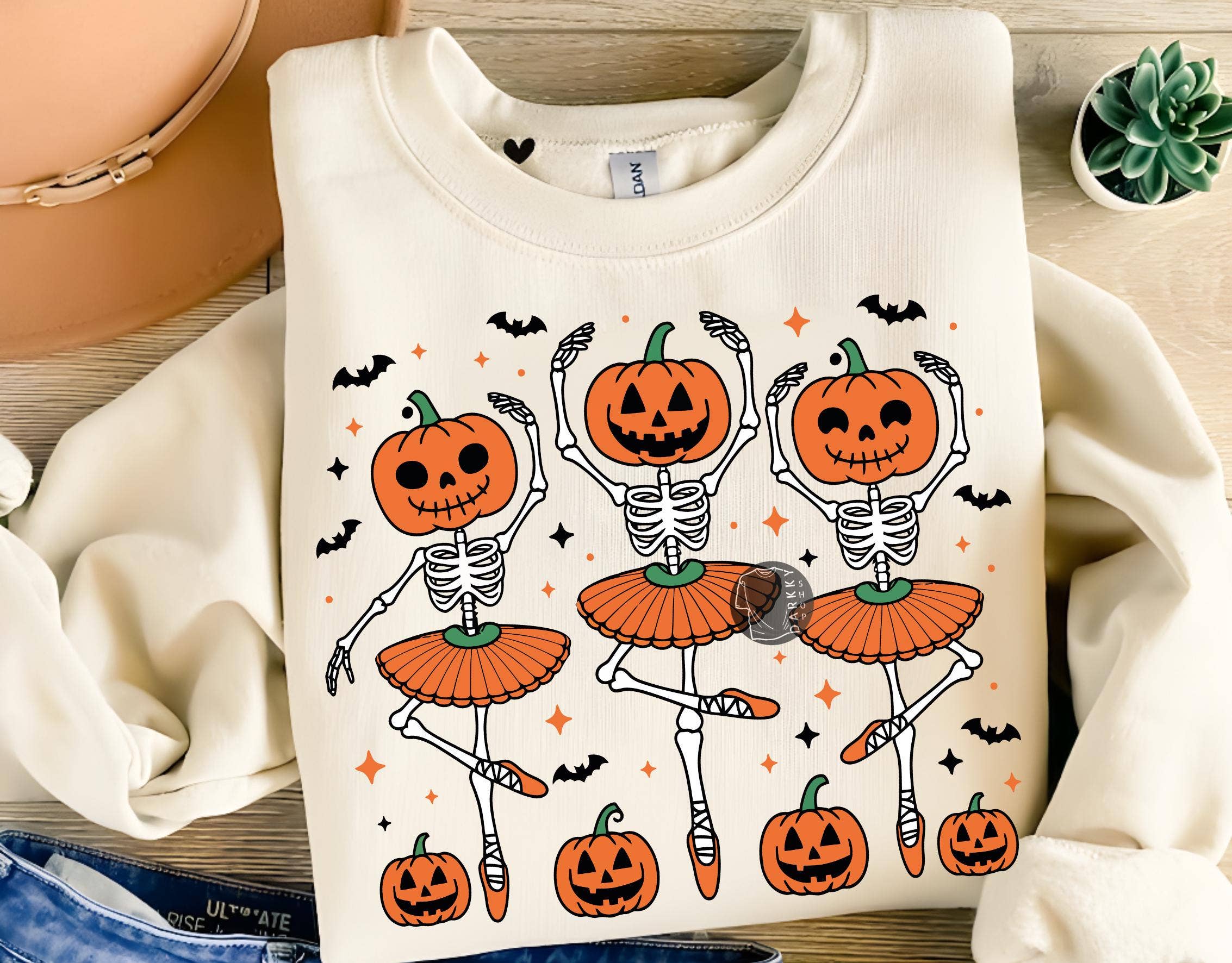NVC Ecommerce LLC - Wholesale T-Shirt (Graphic) - Women's - Ballet Dancing Skeleton Tee, Halloween Pumpkin Sweater