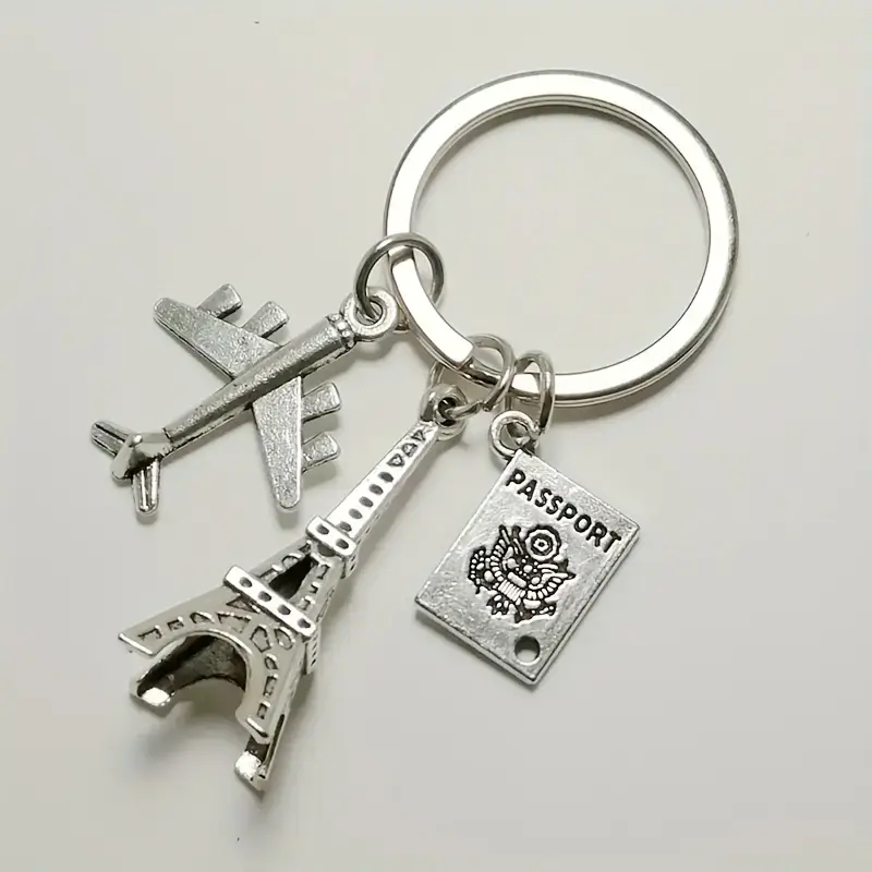 Magnifique Hearts – Großhandel Schlüsselanhänger – Damen – Flugzeug-Passanhänger mit Eiffelturm – Reisesouvenir1