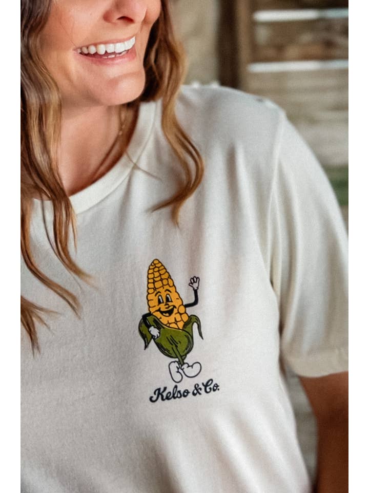 Kelso & Company - Vendita all'ingrosso Maglietta serigrafata - Unisex - T-shirt con grafica Ahhh Shucks Dancing Corn in erica naturale2