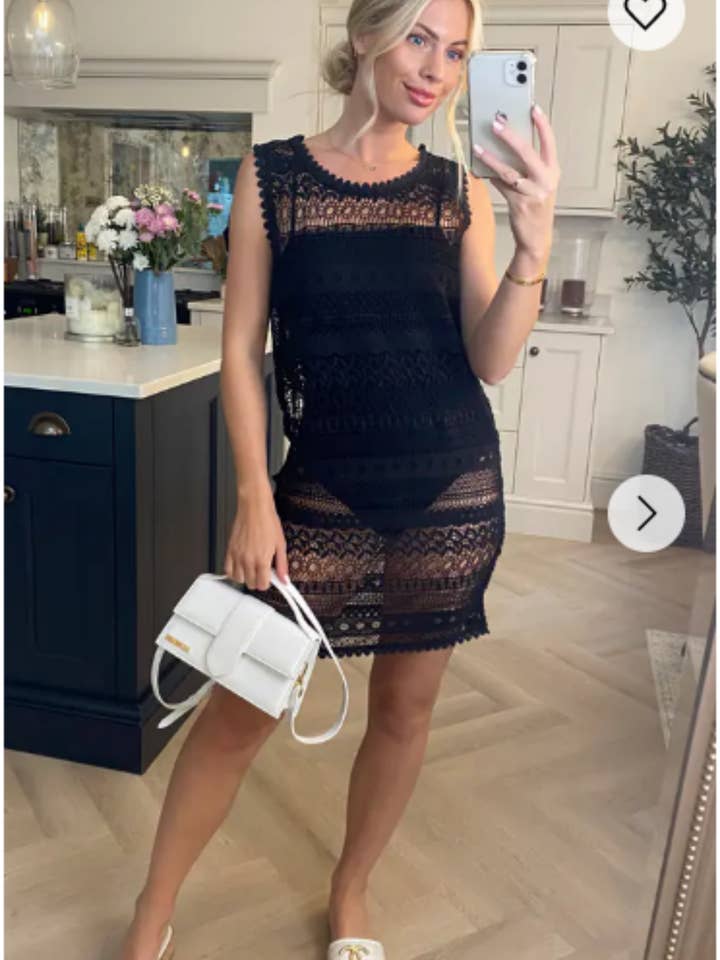 Abito da spiaggia in pizzo all'uncinetto con stampa floreale nera per la vendita all'ingrosso da parte di CY FASHION. LONDON