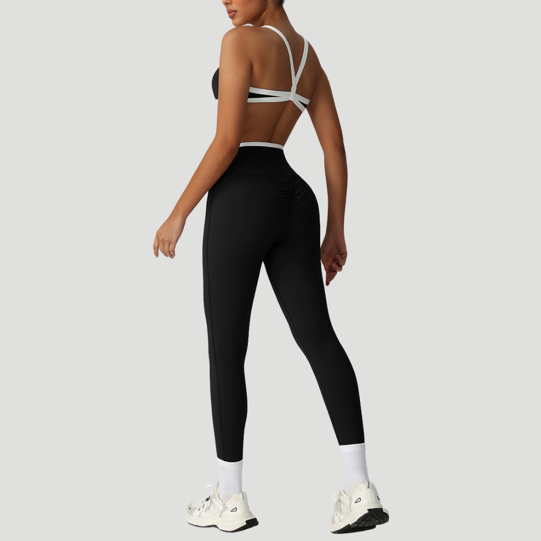 Sodalemon - Vendita all'ingrosso Completo sportivo - Donna - Set due pezzi con reggiseno incrociato e pantaloni sportivi a vita alta2