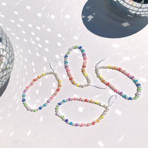Purchase Wholesale beaded phone charm. Free Returns & Net 60 Terms on Faire