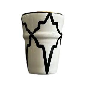 Teba Handmade Ceramic Coffee Mug in Black and White for wholesale by Waanda GmbH