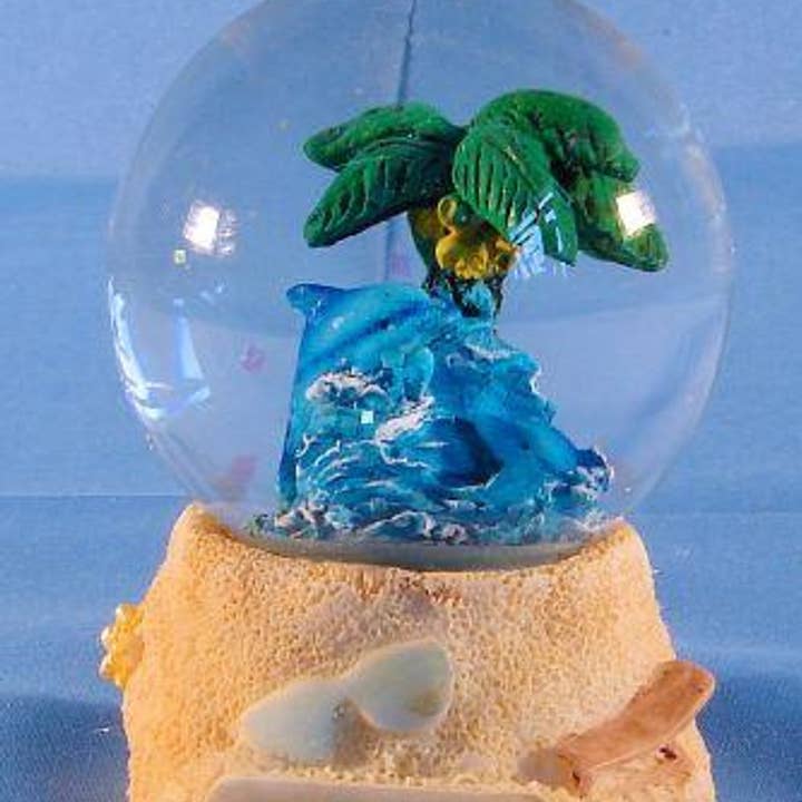 Dolphin W/Palm Globe 45mm for wholesale by Sea Creations