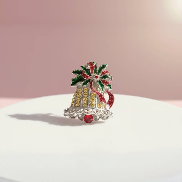 Silver Crystal Bell Festive Brooch for wholesale on Faire