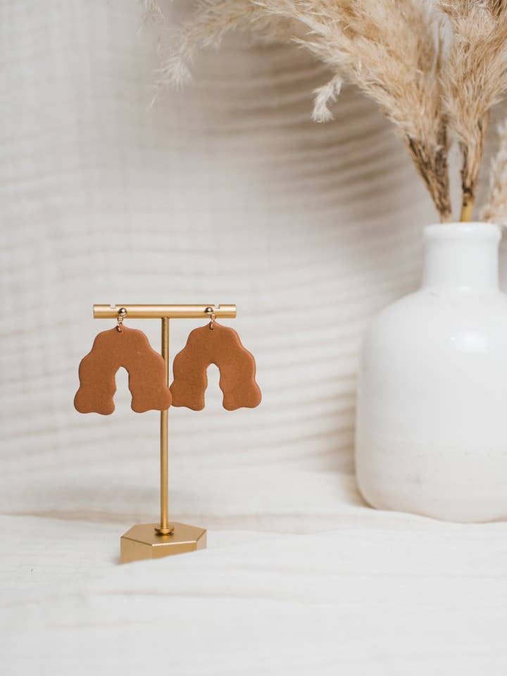 Honey Wavy Arch Dangles for wholesale by Rielle & Co.