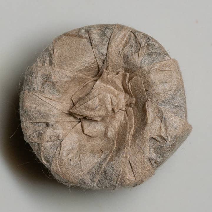 Pu Erh Teer - Forntida Tou Cha kakor för wholesale av Shisso Tea Company