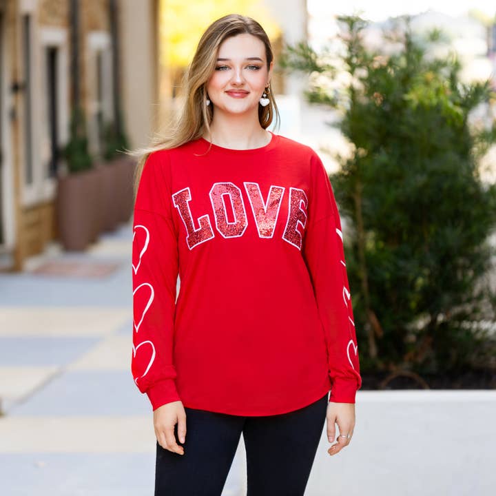 LOVE paillettetop med trykte hjertesleeves for engroshandel hos Your Fashion Wholesale