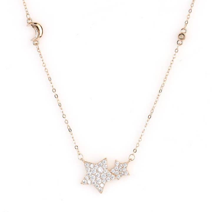 Stjerne- og Månehalskæde med Indlejrede Fængslende Krystaller for engroshandel hos United Elegance