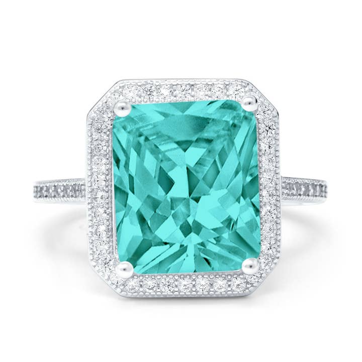 Anillo de compromiso con talla esmeralda con forma de halo, turmalina paraíba simulada, circonita cúbica para venta al por mayor de Blue Apple Imports