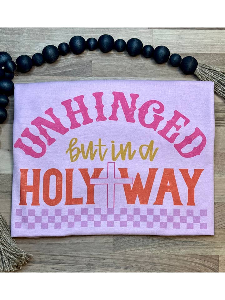 Light Pink Unhinged But In A Holy Way SUBLIMATION TEE for wholesale on Faire