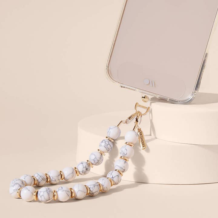 Beaded Marble Phone Wristlet for wholesale on Faire