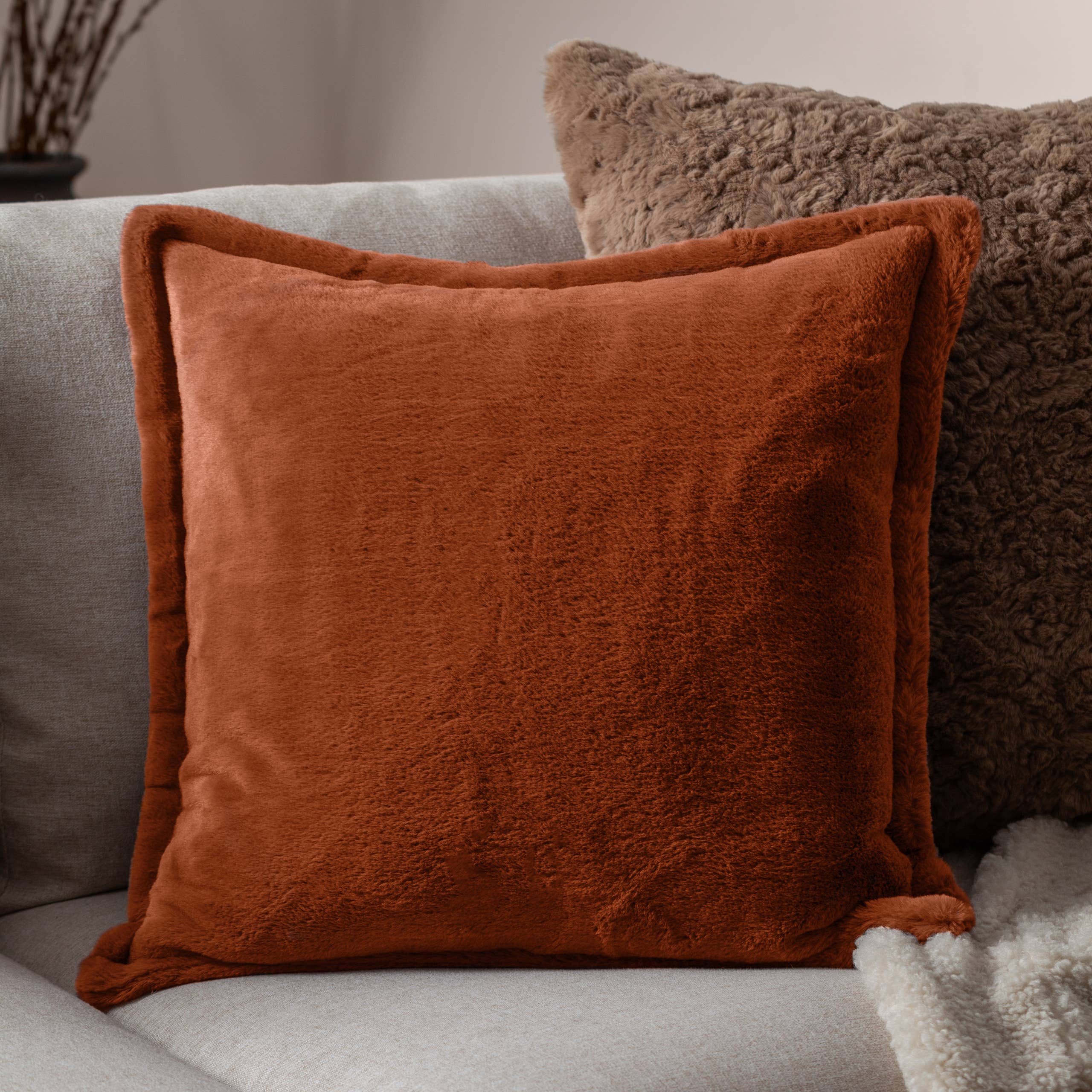 Kallu Faux Fur Cushion Rust for wholesale on Faire0
