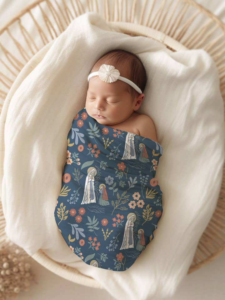 The Stump of Jesse - Wholesale Swaddle - Baby - Our Lady of Lourdes & St. Bernadette Deluxe Swaddle Catholic