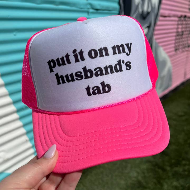 Put It On My Husband’s Tab Trucker Cap (Multiple Color Options) for wholesale by Turquoise & Tequila