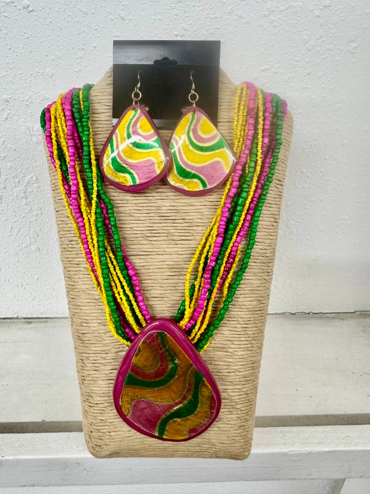 12 STRANDS MULTI COLOR SEED BEADS WITH IRREGULAR RESIN PENDA for wholesale by International Duru's