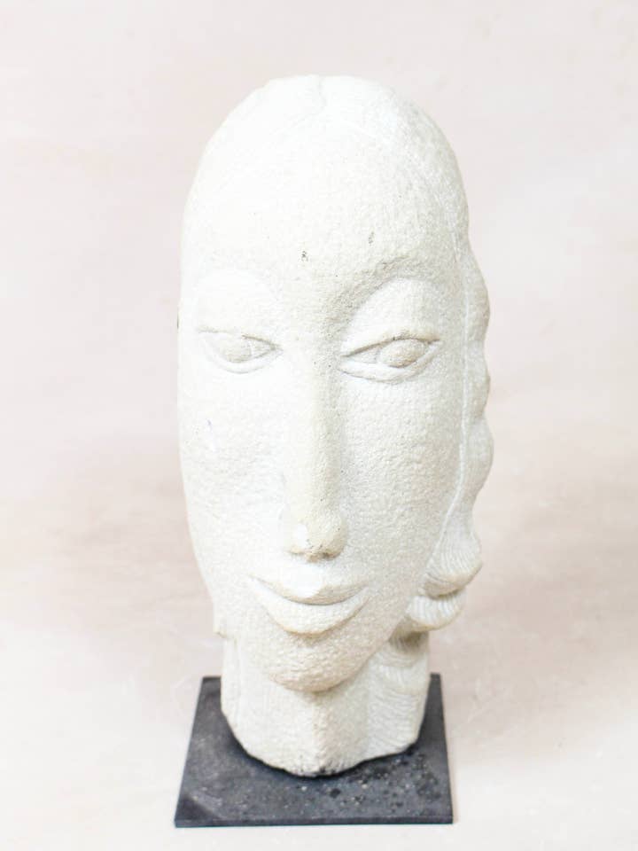 Stone head sculpture by Rizimu Chiwawa Zimbabwe 31.03 for wholesale by Botanical Boys