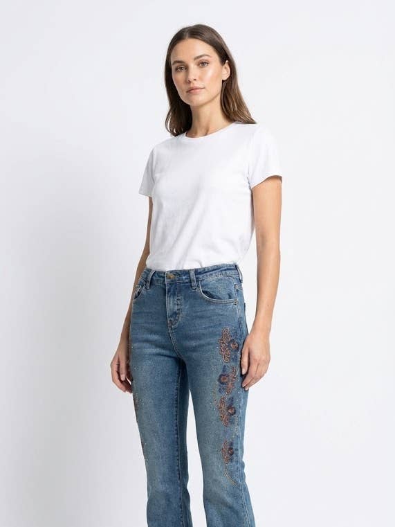 Jean évasé brodé de fleurs pour la vente par ELPPIS US