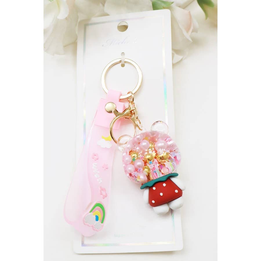PINK Floating Pearl and Glitter Kitty Key Chain for wholesale on Faire1