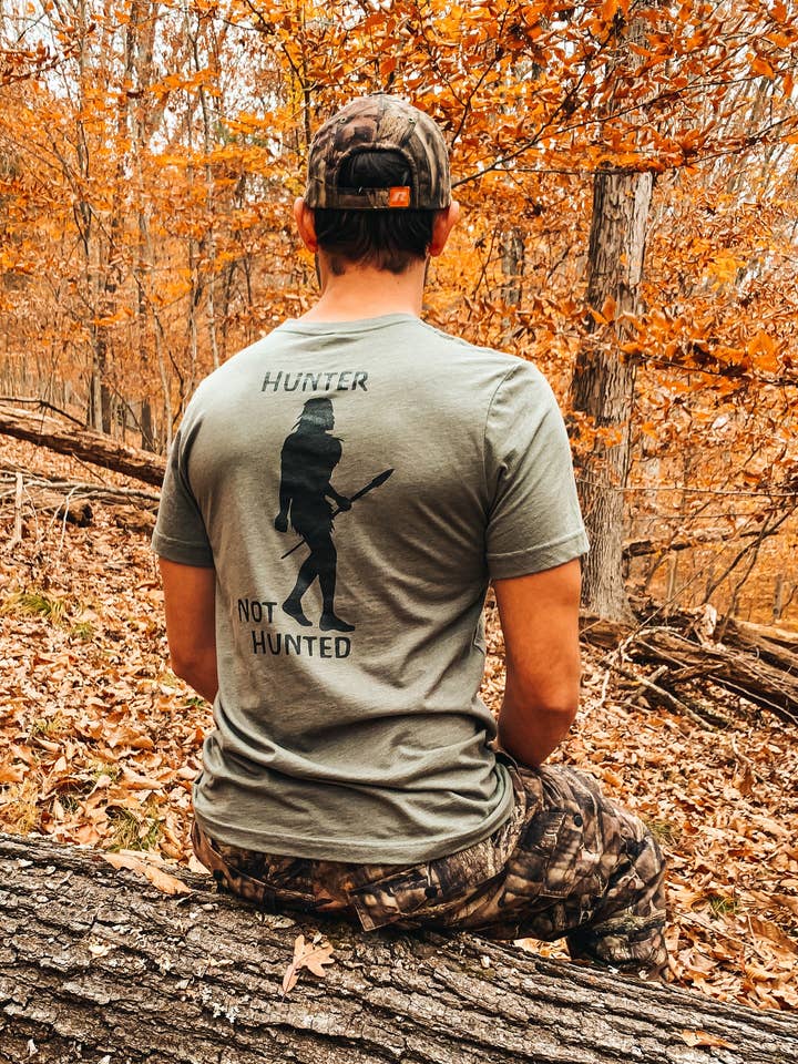 Hunter Not Hunted T-Shirt for wholesale by The Original Neanderthal LLC