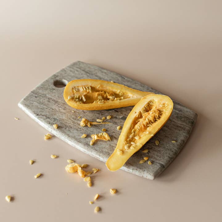 Soren 14" Beige Marble Serving Board for wholesale by Foreside Home & Garden