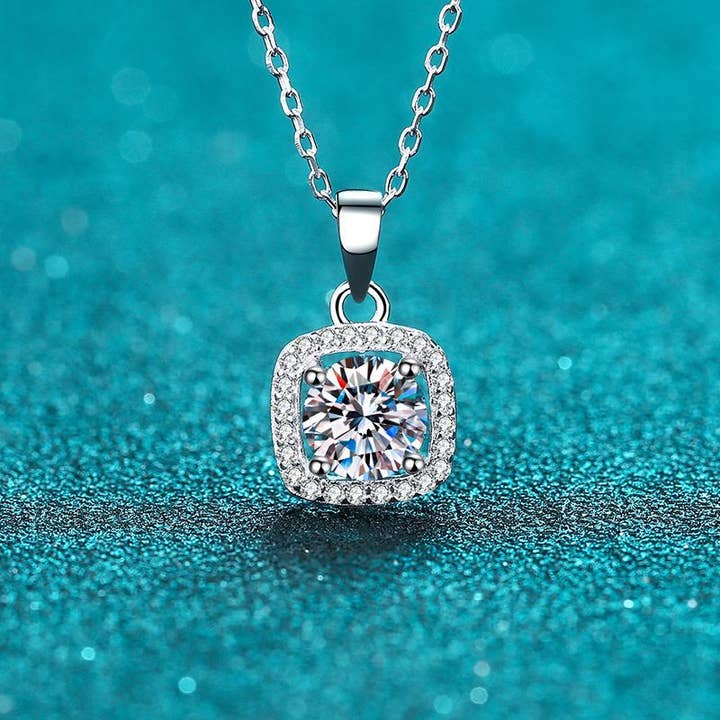Four-Prong Halo Moissanite Necklace in 925 Sterling Silver for wholesale by Perimade & Co. LLC