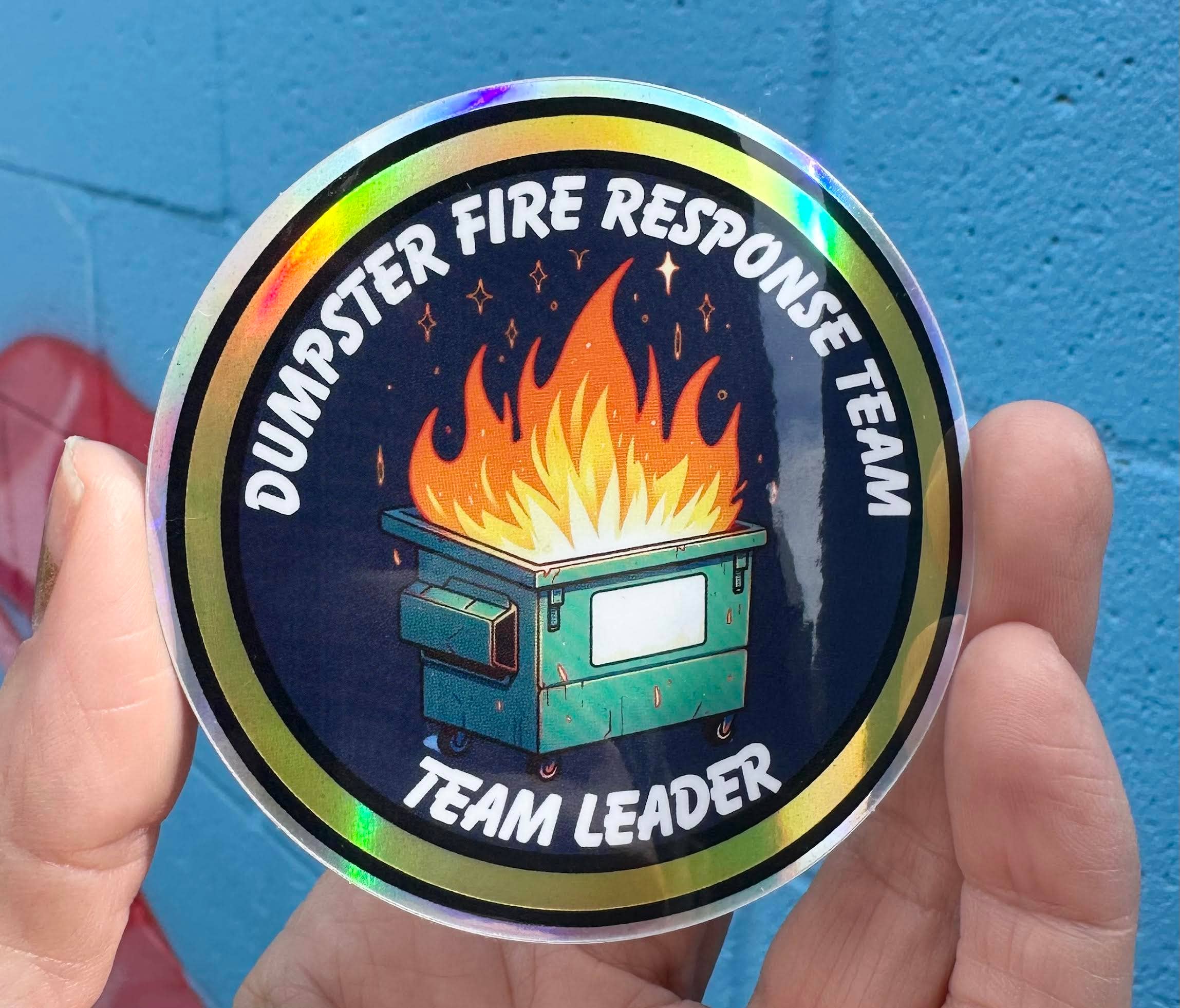 Hilarious Humanitarian - Wholesale Sticker - Dumpster Fire Response Team Team Leader Holographic Sticker2