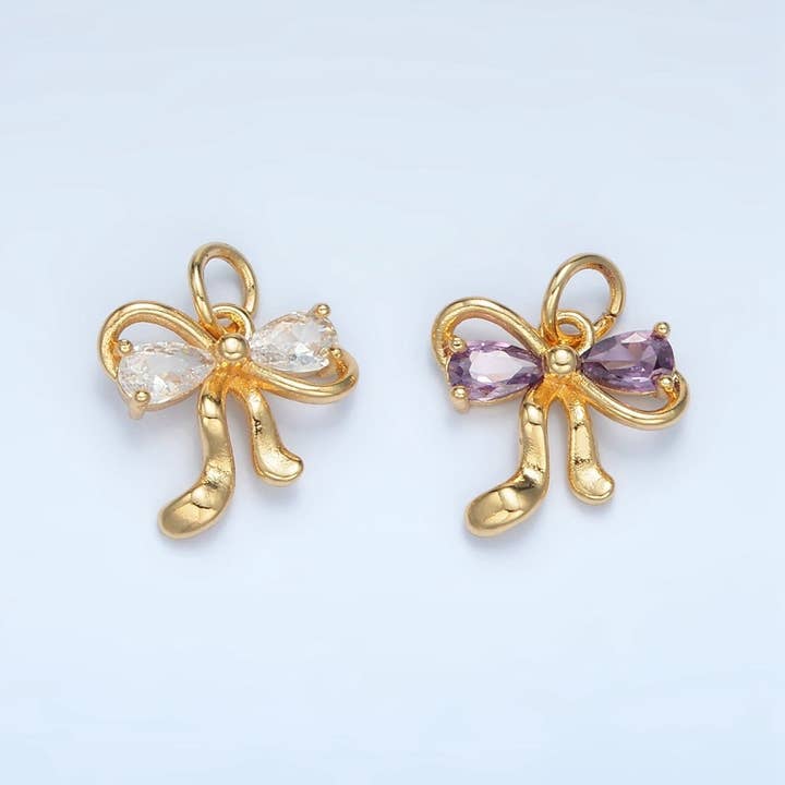 Charm de lazo con cinta de circonitas cúbicas transparentes, moradas, melocotón y rosas, relleno de oro de 24K | X563 X564 para venta al por mayor de Aim Eternal