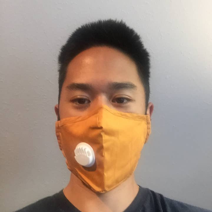 Sunset Orange katoenen gezichtsmasker met ontluchtingsklep voor wholesale door Sunkiss