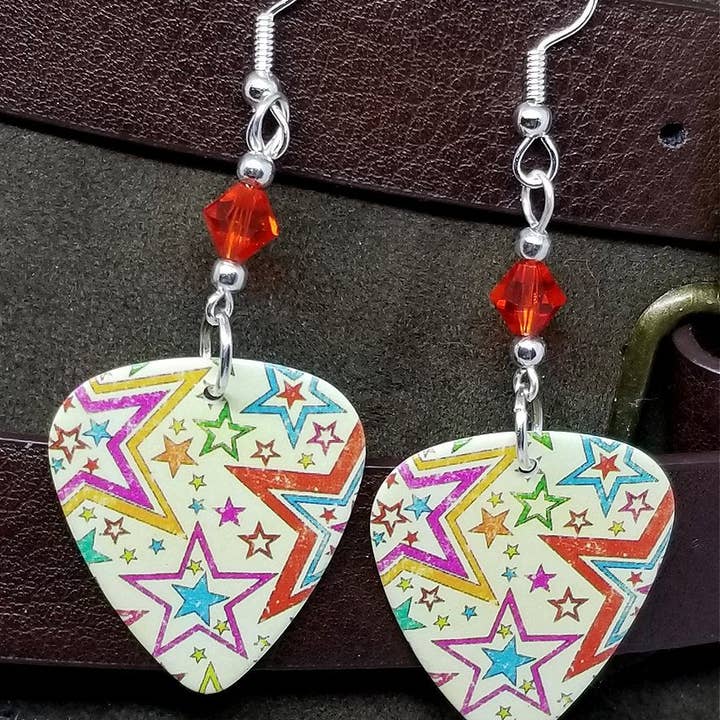 Yellow Starry Guitar Pick Earrings with Swarovski Crystals and other Purchase Wholesale long sparklers. Free Returns & Net 60 Terms on Faire trending on Faire.
