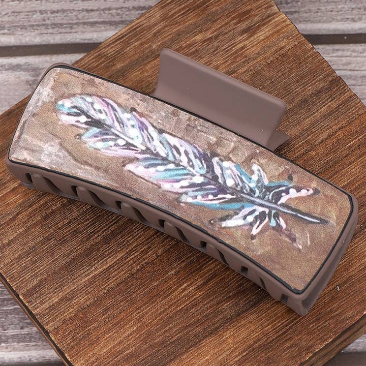TYPE FEATHER PRINT LEATHER HAIR CLAW CLIPS WESTERN_CWAHA0602 for wholesale on Faire