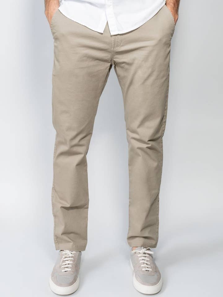 Pantalon élastique beige pour la vente par DANTE