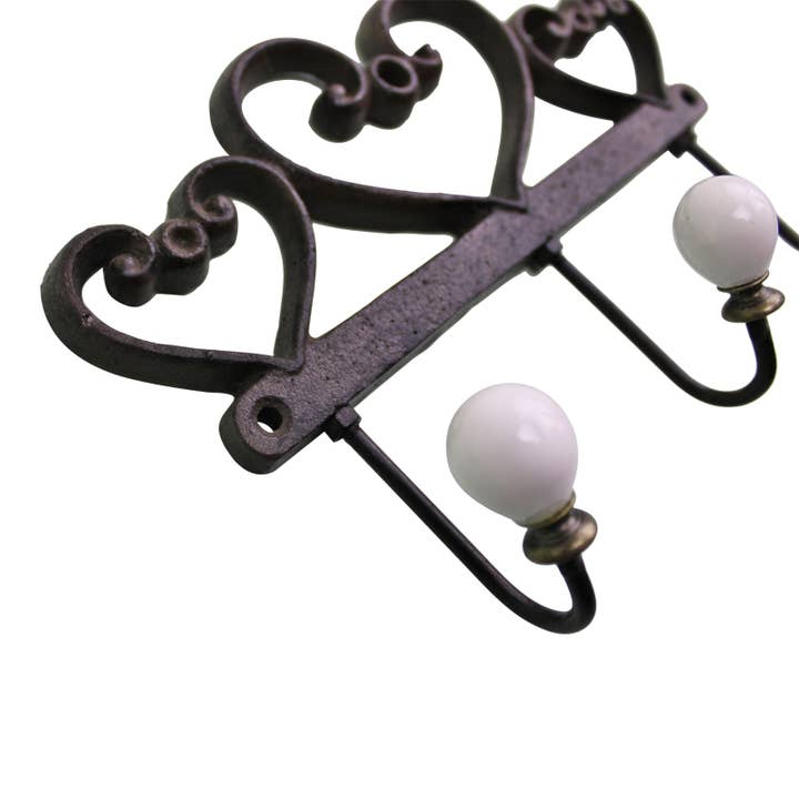 Brown Rustic Cast Iron Wall Hooks, Hearts for wholesale on Faire