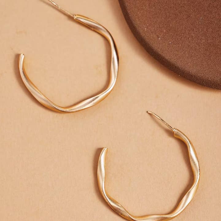 Revelari - Wholesale Hoop Earrings - Twisted Minimalist Gold Hoop Earrings1
