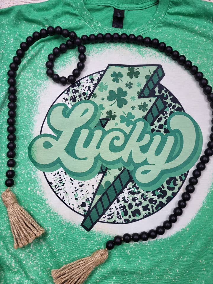 T-shirt Lucky Bleached per la vendita all'ingrosso da parte di Wanderlust Designs Wholesale