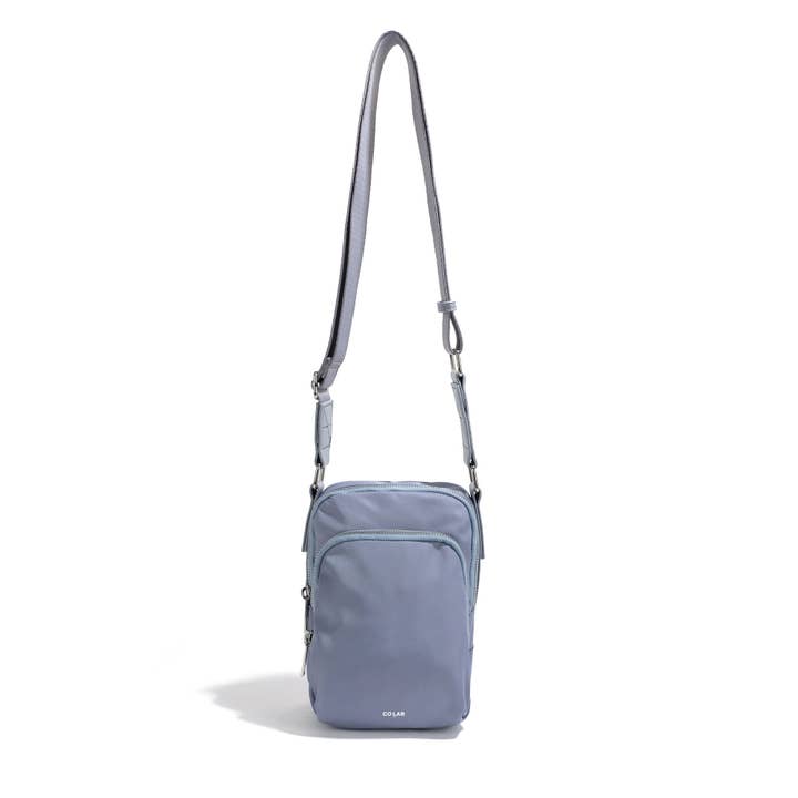 The 'LINDA' Tech Crossbody and other Purchase Wholesale purse and slides. Free Returns & Net 60 Terms on Faire trending on Faire.