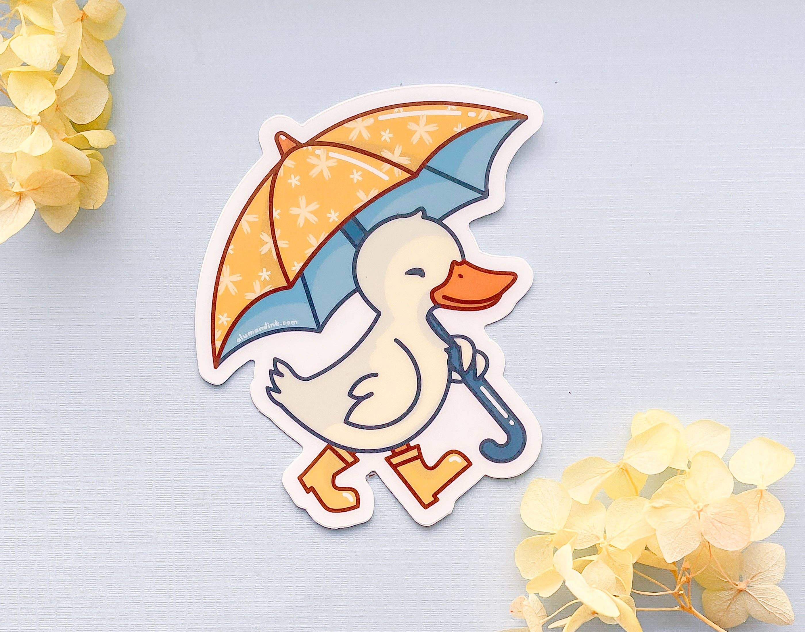 Alum and Ink - Wholesale Sticker - Duck with Rain Boots and Umbrella Clear Vinyl Sticker1