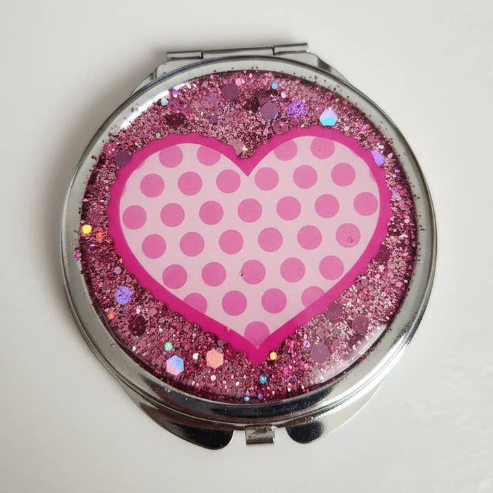 Espejo compacto con forma de corazón rosa con purpurina para venta al por mayor de Blue Bourbon Designs