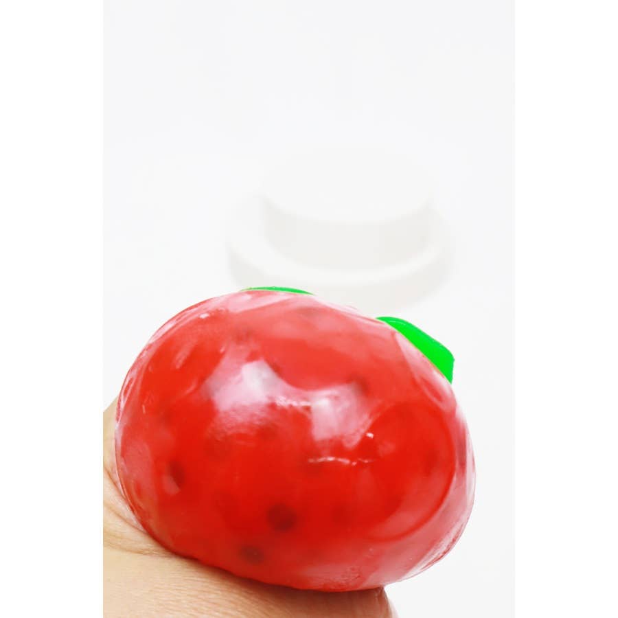 ROUGE Squishy parfumé à la fraise avec Orbit en vente sur Faire3