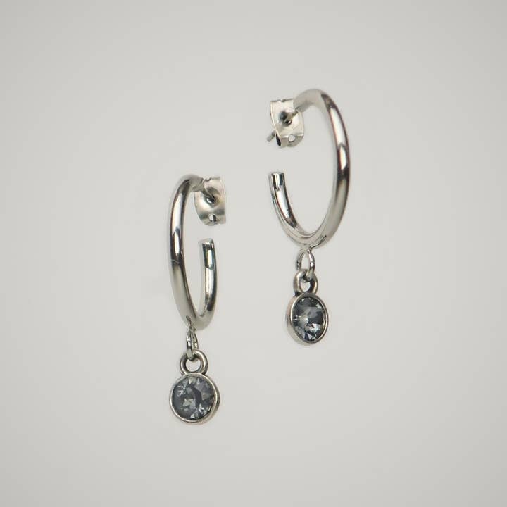Open hoop earrings with a “silver shade” crystal for wholesale by Lollia Modeschmuck