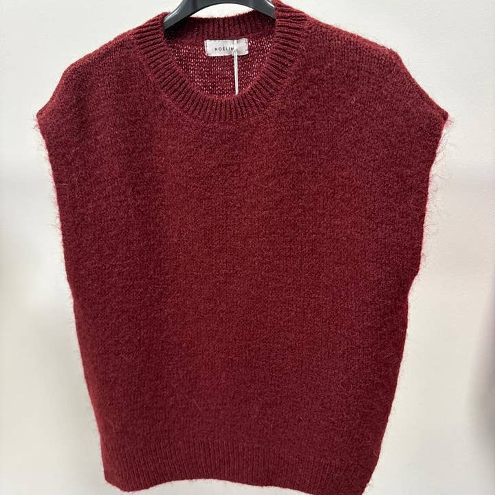 Sleeveless sweater 40% kid mohair 7652 and other Purchase Wholesale stickerbogen. Free Returns & Net 60 Terms on Faire trending on Faire.