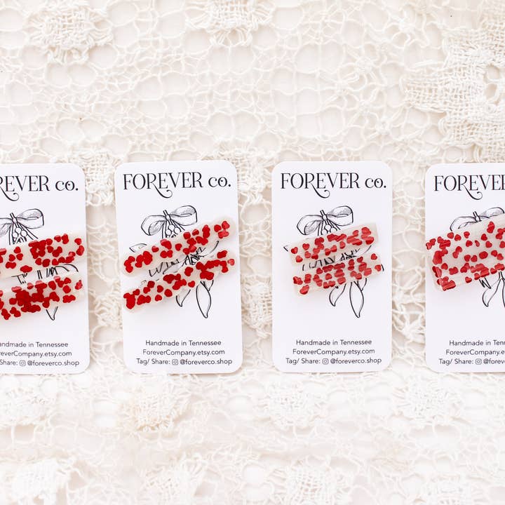 Hartvormige haarspeldjes voor Valentijnsdag (rode glitter/crème) voor wholesale door Forever Company