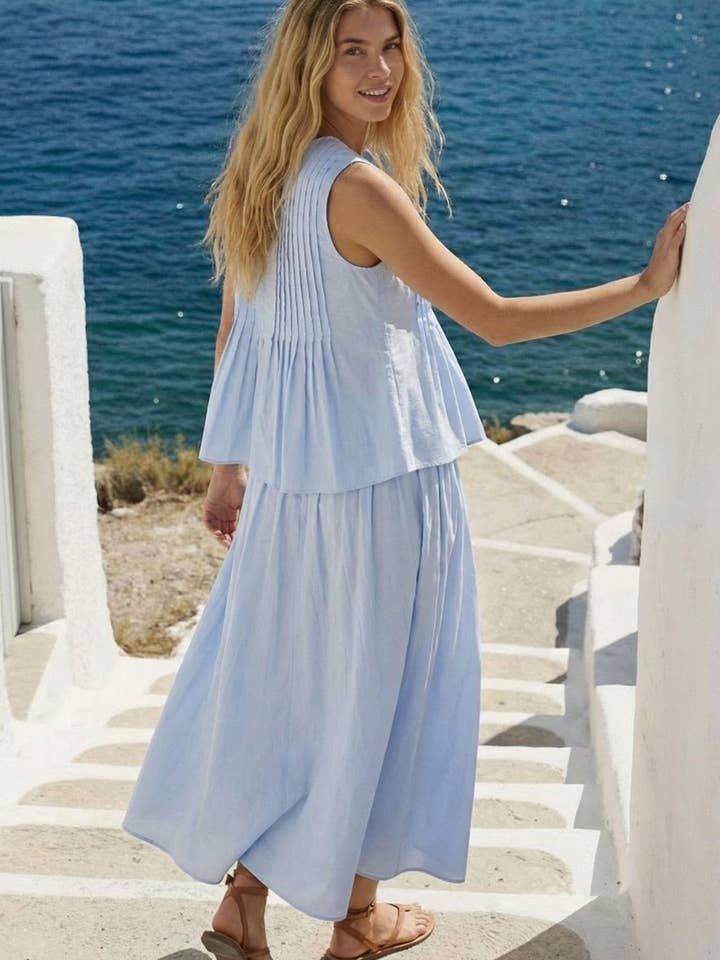 ENSEMBLE JUPE MIDI ET HAUT SANS MANCHES À PLIS IST6371 pour la vente par Klesis