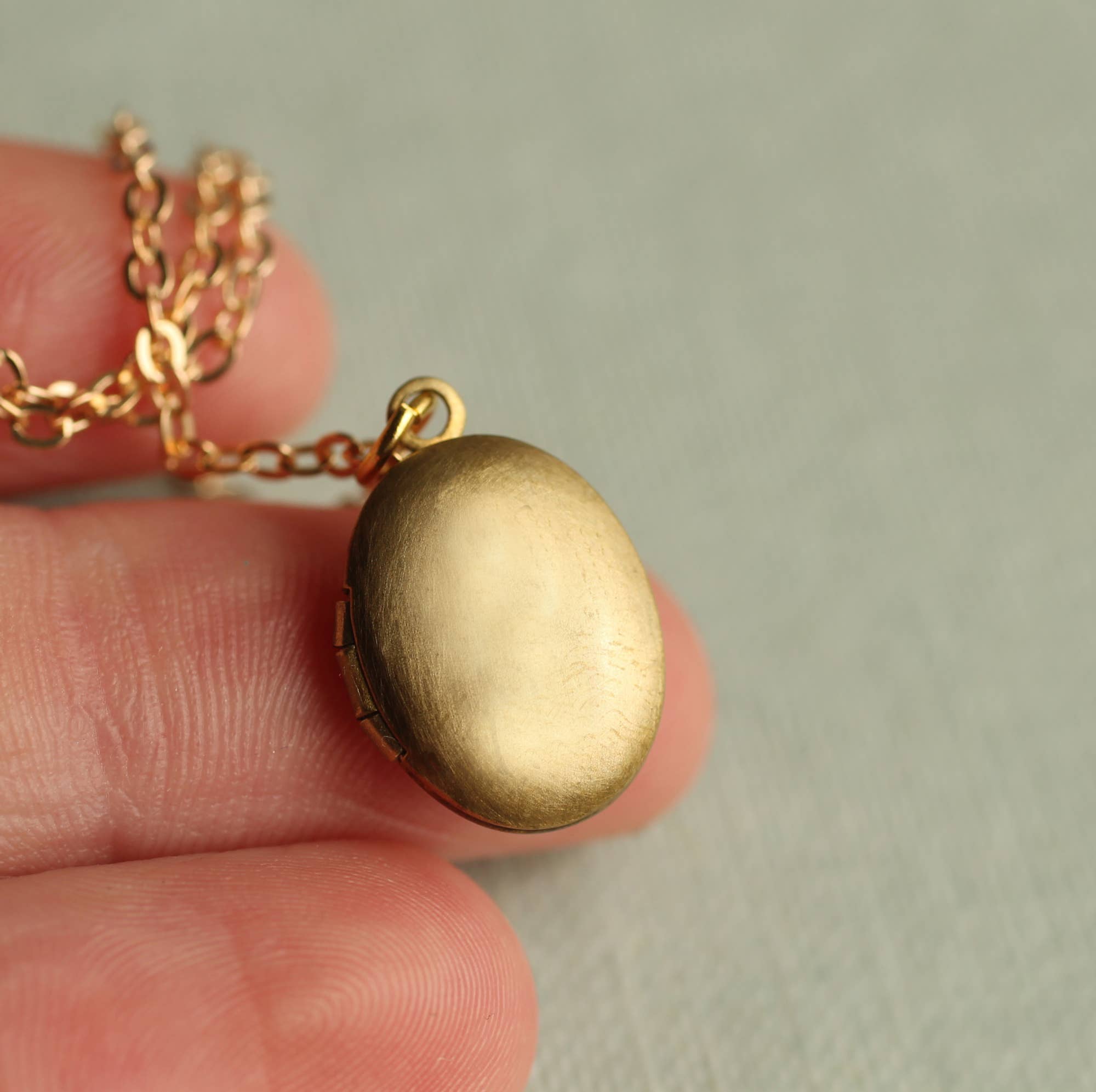 Silk Purse, Sow's Ear - Wholesale Locket Necklace - Tiny Oval Engraved Botanical Brass Locket0