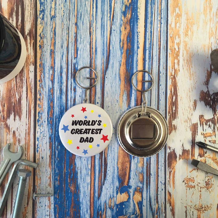 Portachiavi apribottiglie World's Greatest Dad per la vendita all'ingrosso da parte di Dios Designs