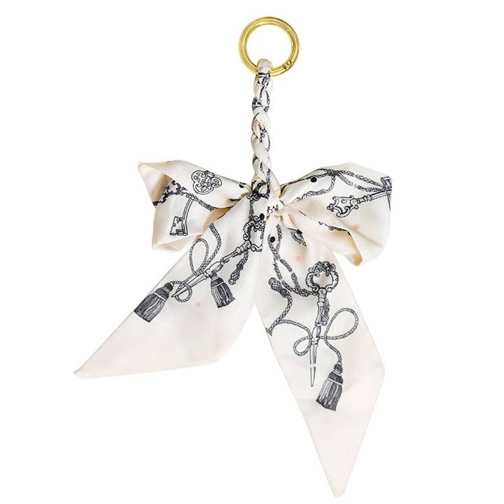 AMORINO SRL – wholesale Nyckelringar - Dam – CHARM VÄSKA NYCKELRING BAND MED ROSETT - MY2444B518