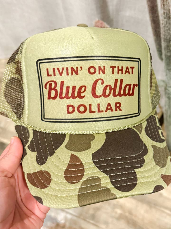 Camo Blue Collar Dollar Trucker Hat for wholesale by The Prickly Five